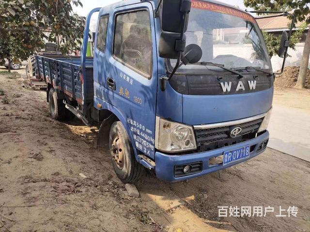 13年奥驰平板货车，后翻自卸，4米大箱的图片