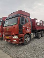 转让二手解放牵引车460马力国五双驱带13米花篮挂