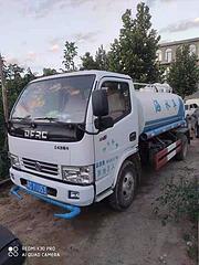 驻马店急卖18年蓝牌国五东风多利卡5吨洒水车