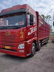 出售21年解放JH6前四后八9.6米高栏载货车