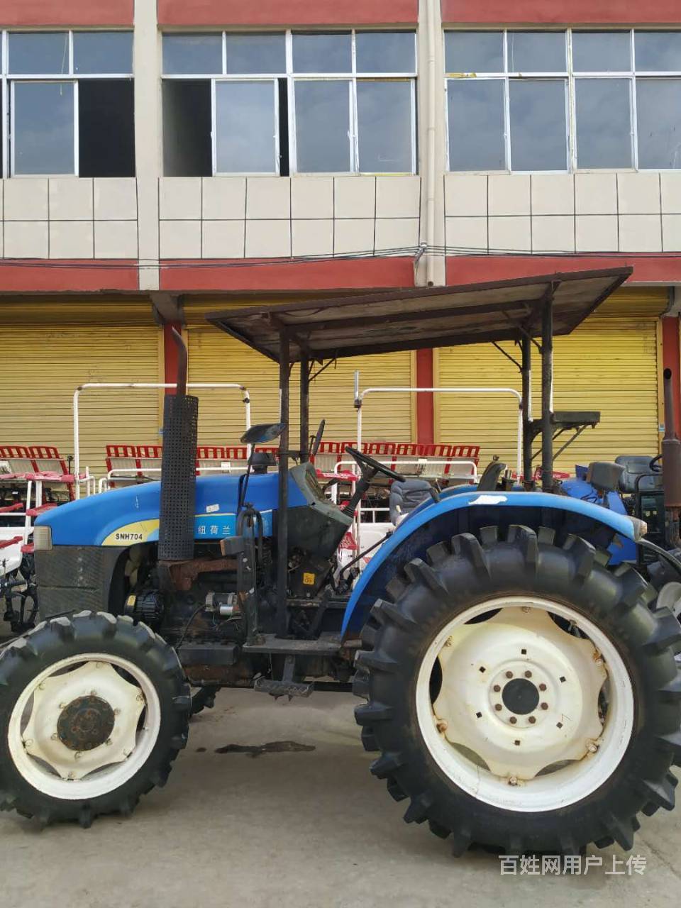 转让12年纽荷兰704