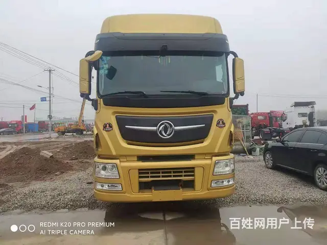 520马力二手东风天龙牵引车带60标箱侧翻挂 - 图片 1